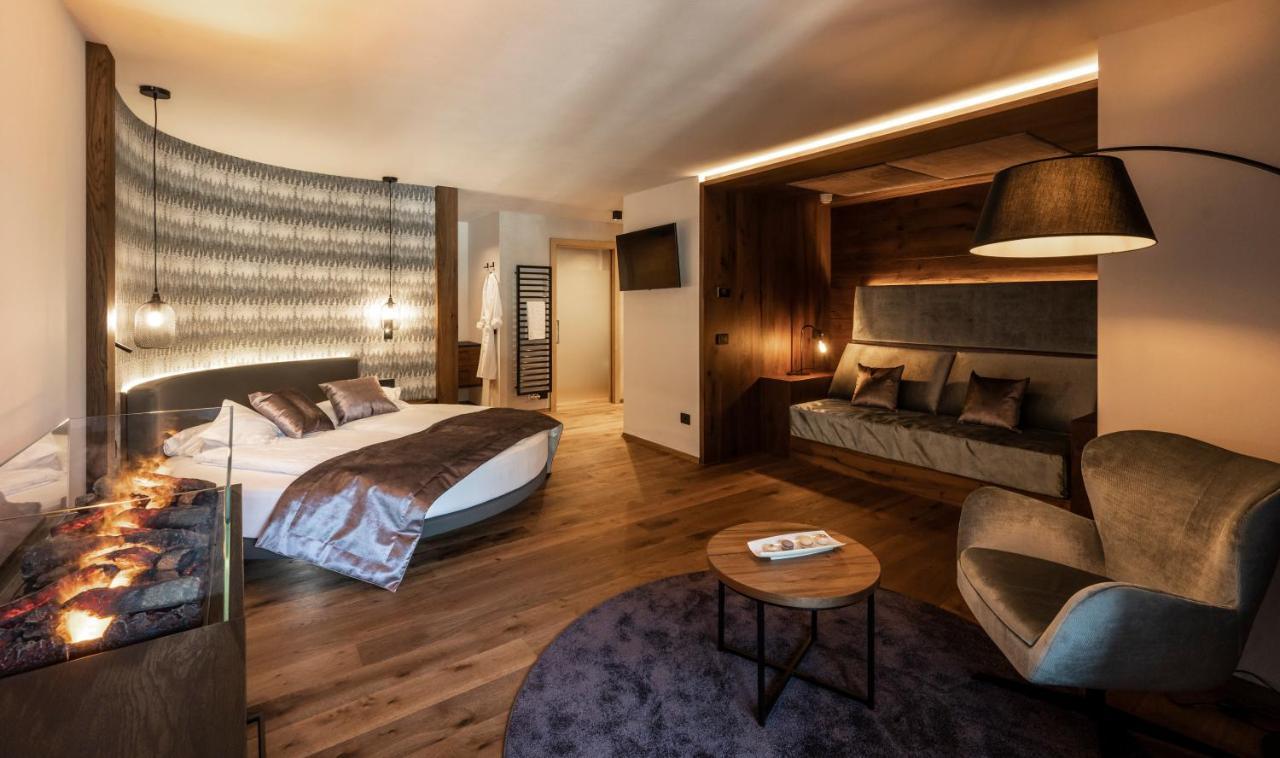 Hotel Ladinia Dolomites View Поцца-ді-Фасса Екстер'єр фото