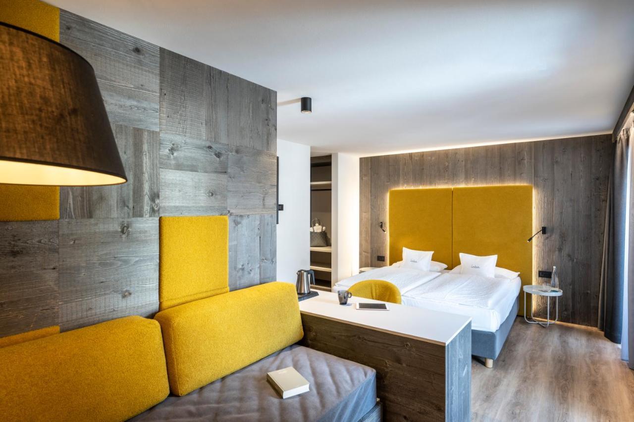 Hotel Ladinia Dolomites View Поцца-ді-Фасса Екстер'єр фото