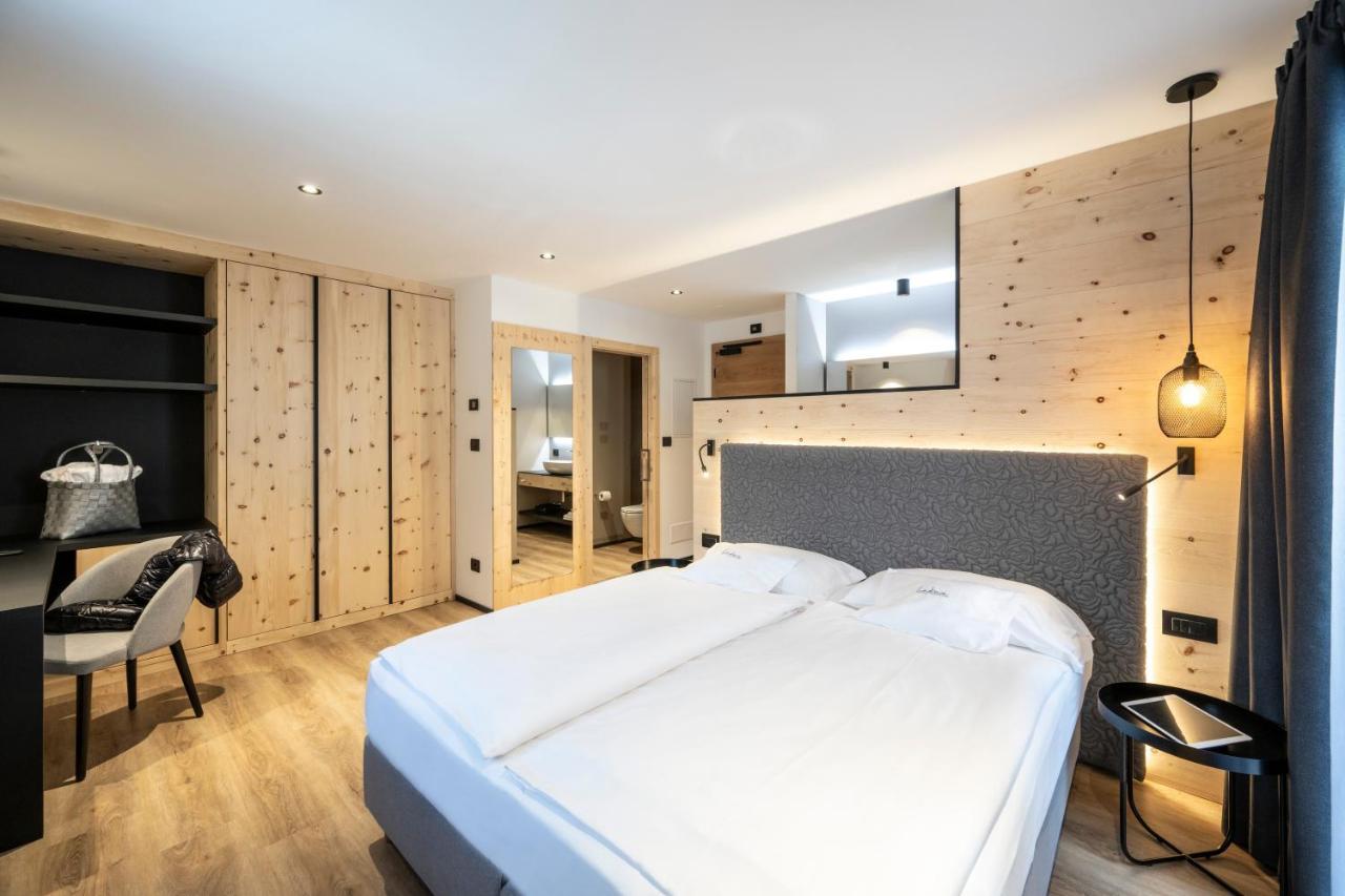 Hotel Ladinia Dolomites View Поцца-ді-Фасса Екстер'єр фото